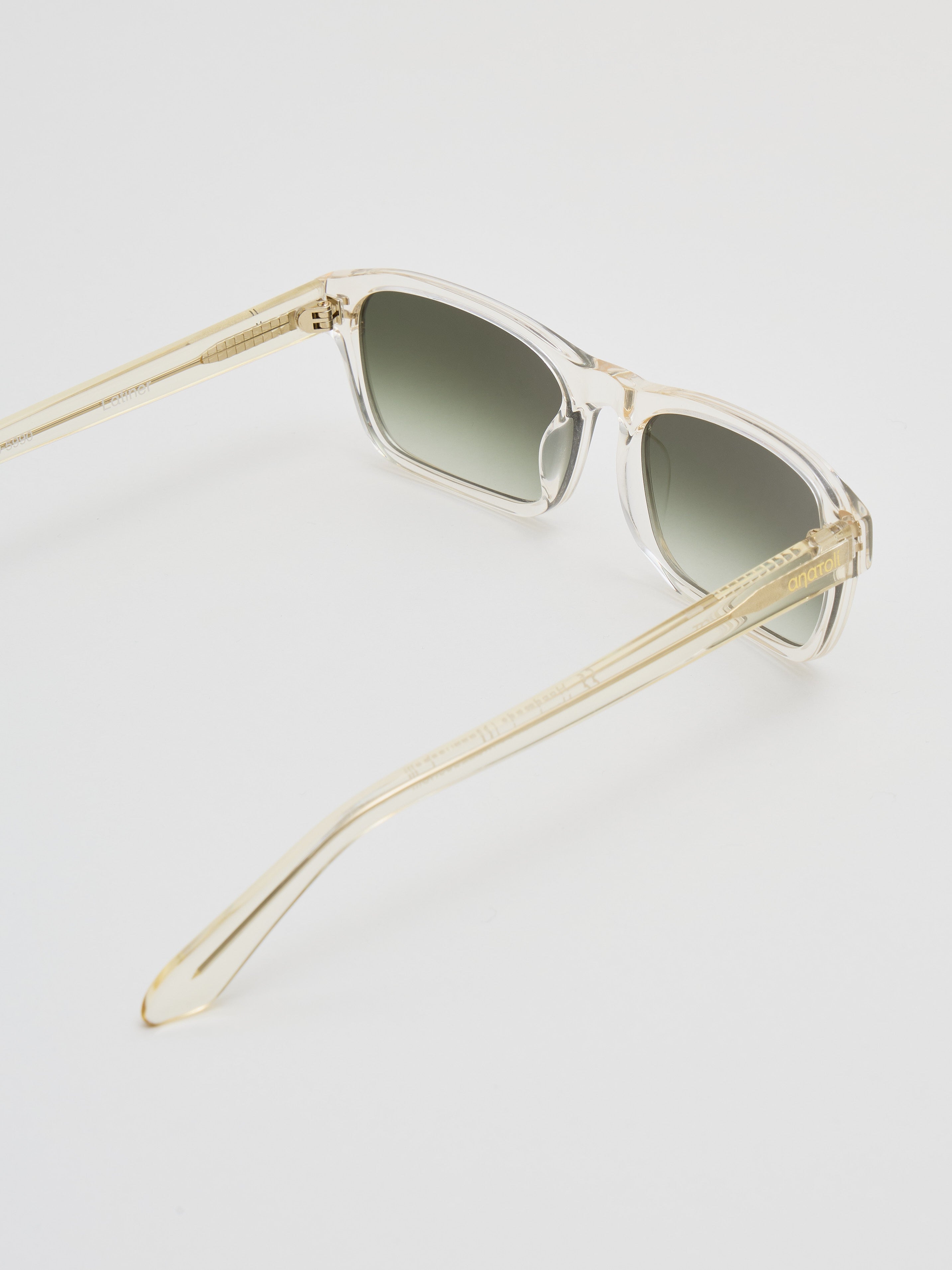 Side view of Latiner sunglasses in Transparent Yellow acetate with subtle logo detail on temple